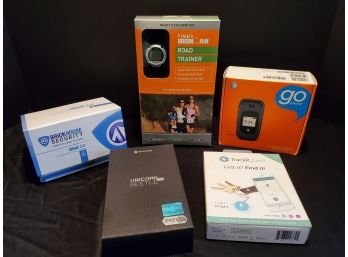 Electronics Lot With Go Phone, Timex Heart Rate Monitor, Trackr Key Finder, Portable Alarm Clock Camera & More