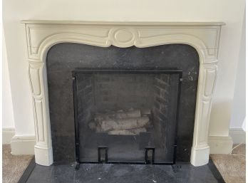 A Vintage Wood Mantle And Soapstone Fireplace Surround