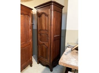 An Early 20th Century French Provincial Style Paneled Oak Wardrobe