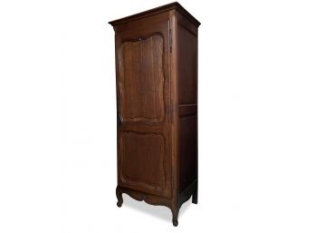 A Late 19th Century French Provincial Paneled Oak Wardrobe