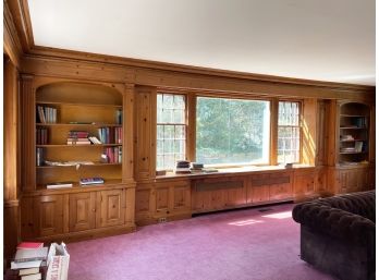 A Library Of Vintage Shelves And Solid Wood Panelling
