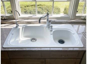 A Ceramic Sink With Italian Chrome Fittings