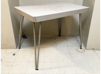 A Mid Century Modern Formica Top Table With Chrome Hairpin Legs