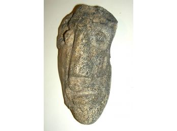 Fossil Mastadon Bone With Later Carving Of A Stylized Face