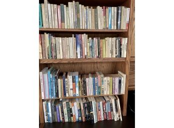 Four Shelves Of  Soft Cover Books - (A)