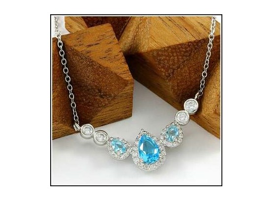 1.40ctw Created  Blue Topaz And White Topaz Gold Overlay Necklace