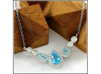 1.40ctw Created  Blue Topaz And White Topaz Gold Overlay Necklace