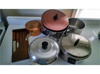 Lot Of Pots And Pans And Knives