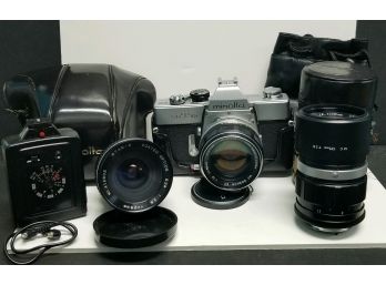 Minolta SRT-101 Camera With Extra Lenses, Accessories & Carrying Case.