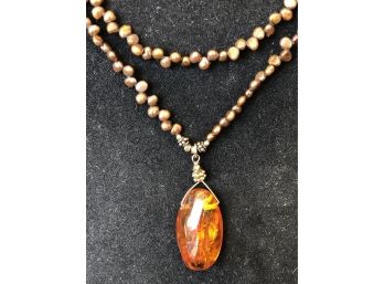 Lovely Large Amber Pendant Necklace With Copper Colored Stone Beads