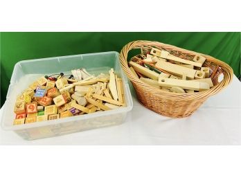 Two Bins Full Of Wooden Blocks And Other Wooden Toys