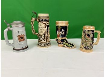 Four Ceramic Beer Steins