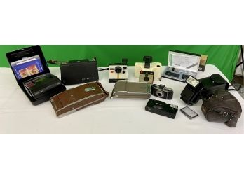 Rare Polariod Onyx Clear Body And More Vintage Polaroid, Canon And Olympus Cameras