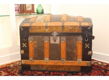 Beautiful Rustic Trunk With Leather Handle Strap And Small Wheels.