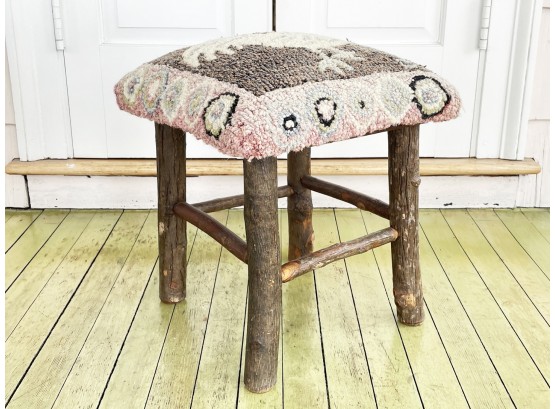 A Primitive Footstool With Hooked Rooster Themed Upholstery