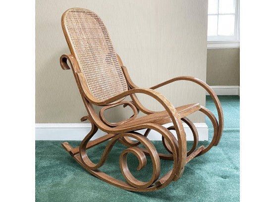 A Vintage Bentwood And Cane Rocker