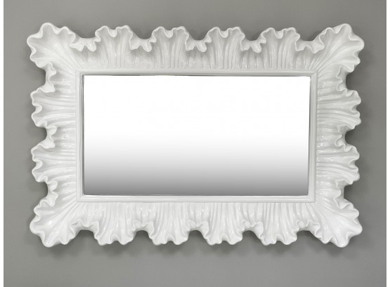 A Large Laquered White Beveled Mirror