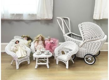 A Collection Of Vintage Dolls And Wicker Doll Accessories
