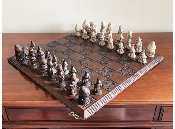 A Vintage Alice And Wonderland Themed Carved Wood Chess Set
