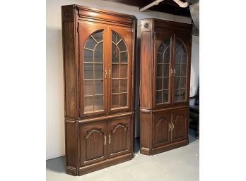 A Pair Of Hardwood Palladian Style Corner Cabinets