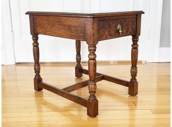A Carved Oak Side Table By Henredon