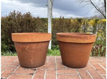 A Pair Of Large Earthenware Planters