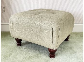 A Tufted, Upholstered Ottoman