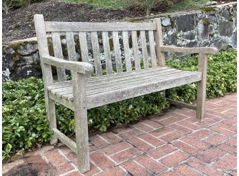 A Weathered Teak Outdoor Bench