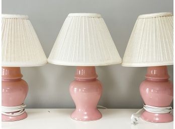 A Trio Of Pink Ceramic Accent Lamps