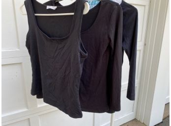 Group Of Black Tops And Wristlet