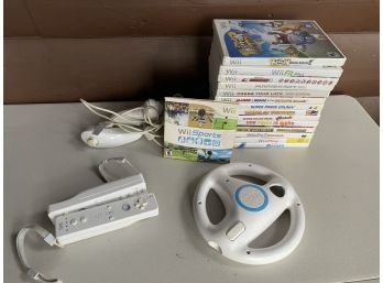 Collection Of Wii Video Games And Accessories