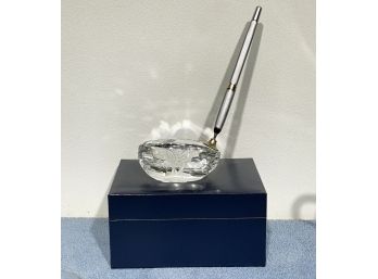 A Crystal Paperweight And Pen Base In Golf Club Form