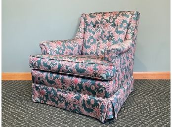 An Upholstered Armchair In Paisley Print