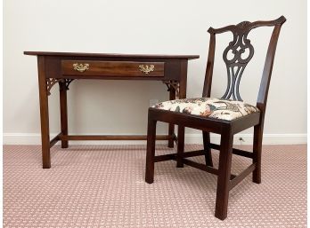 A Mahogany Desk And Chair In Chippendale Style By Councill Furniture