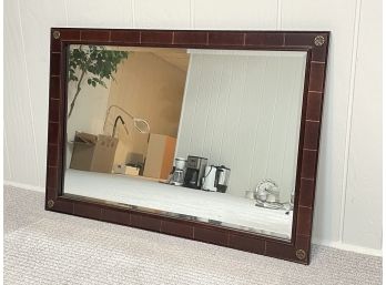 A Large Leather Framed Mirror