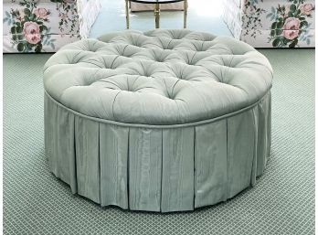 A Tufted Upholstered Pouf Or Ottoman