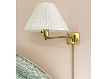 A Pair Of Brass Articulating Arm Sconces