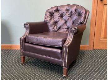 A Tufted Leather Arm Chair With Nailhead Trim By Century Furniture