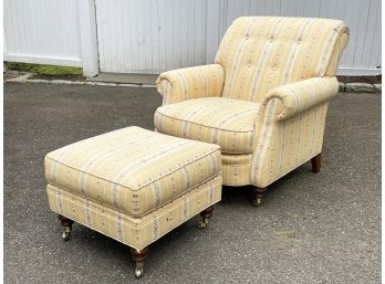An Upholstered Armchair And Ottoman By Hickory Chair