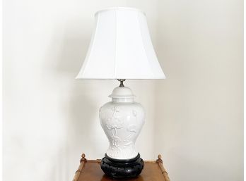 A Glazed Ceramic Lamp With Rosewood Base