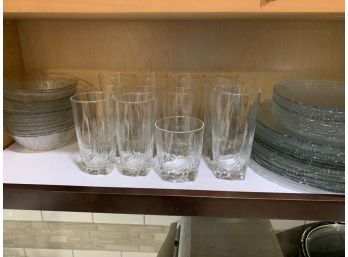 Big Lot Of Everyday Plates And Cups On Bottom Shelf