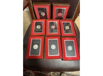 8 Eisenhower 40  Silver Proof Silver Dollars . In Plastic And Origi Brown Boxes .