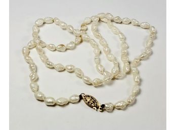 10k Gold And  Baroque Pearl Necklace