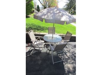 Vintage Out Door Patio Set Consists Of 4 Chairs, Glass Table And Sun Umbrella