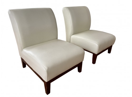 Pair Of Leather Slipper Chairs With Wooden Legs