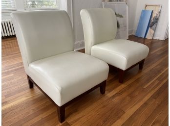 Pair Of Leather Slipper Chairs With Wooden Legs