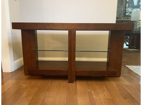 A Modern Mahogany Sofa Table With Glass Shelf