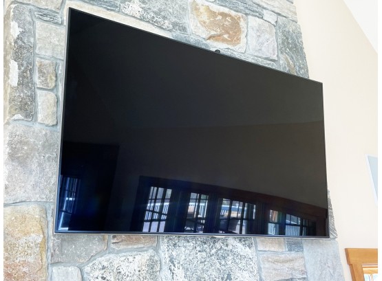 A Samsing 60' Smart TV And Accessories