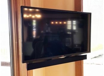 An LG 38' Flat Screen TV With Wall Mount