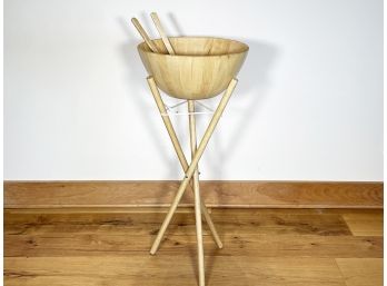 A Wood Salad Bowl On Stand